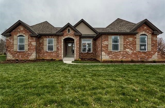 Gorgeous brick and stone and elevation on this 3 bedrooms, 2.5 bath, 3-car side entry ranch on quite cul-de-sac.  Estates at Emerald Place is a small enclave of high-end custom homes located near Hwy 40, Hwy 94 and Page Extension.