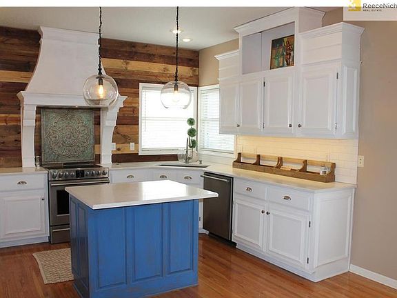 Beautifully updated kitchen with quartz counter tops.