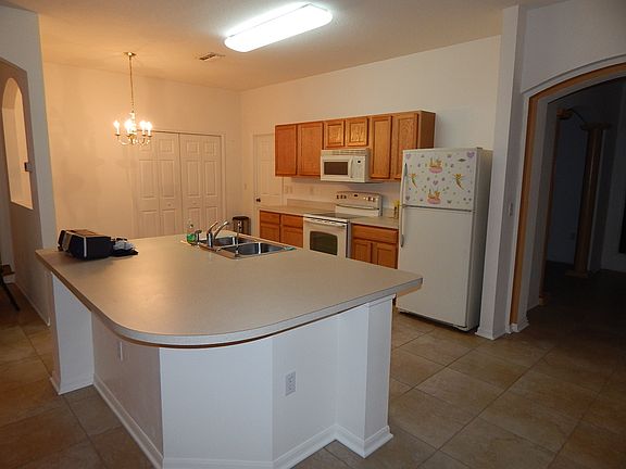 Kitchen, island and nook.