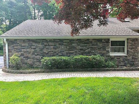 Stone covers garage. 