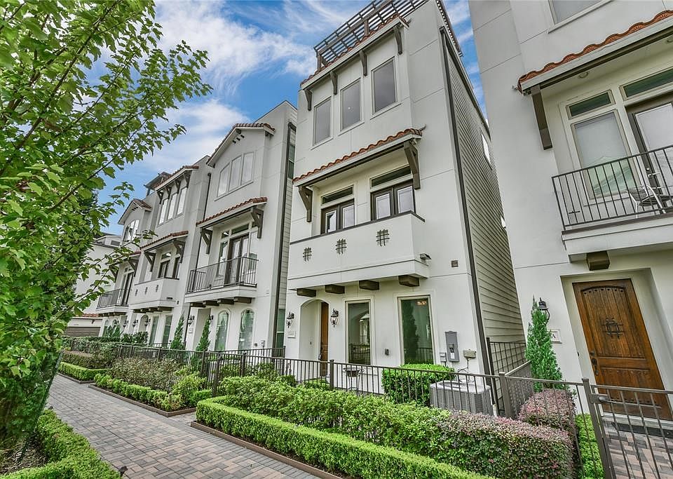 This home is nestled in a gated community with luscious landscaping throughout entire community.