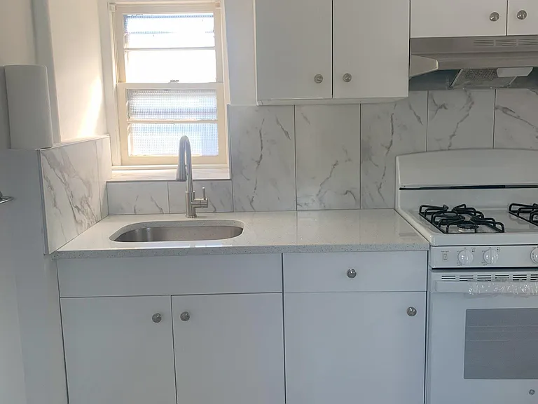 Kitchen with LOTS of storage spaces.