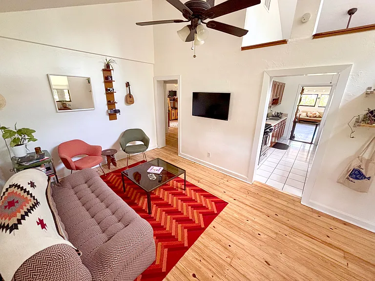 Living space with unique vaulted ceiling feature