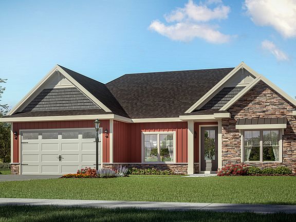 Our latest concept of the Owen Floorplan, featuring shake and vertical style siding and masonry acce
