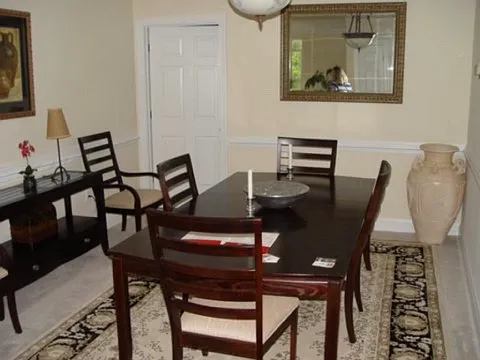 Dining room with entrance to second bedroom
