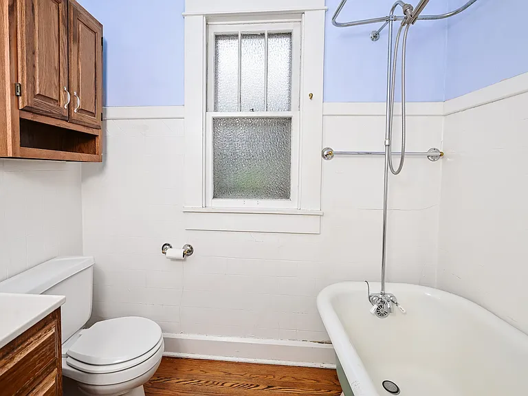 Bathroom with clawfoot tub.