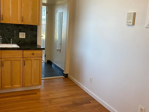 Kitchen and hallway leading to the back bed room.