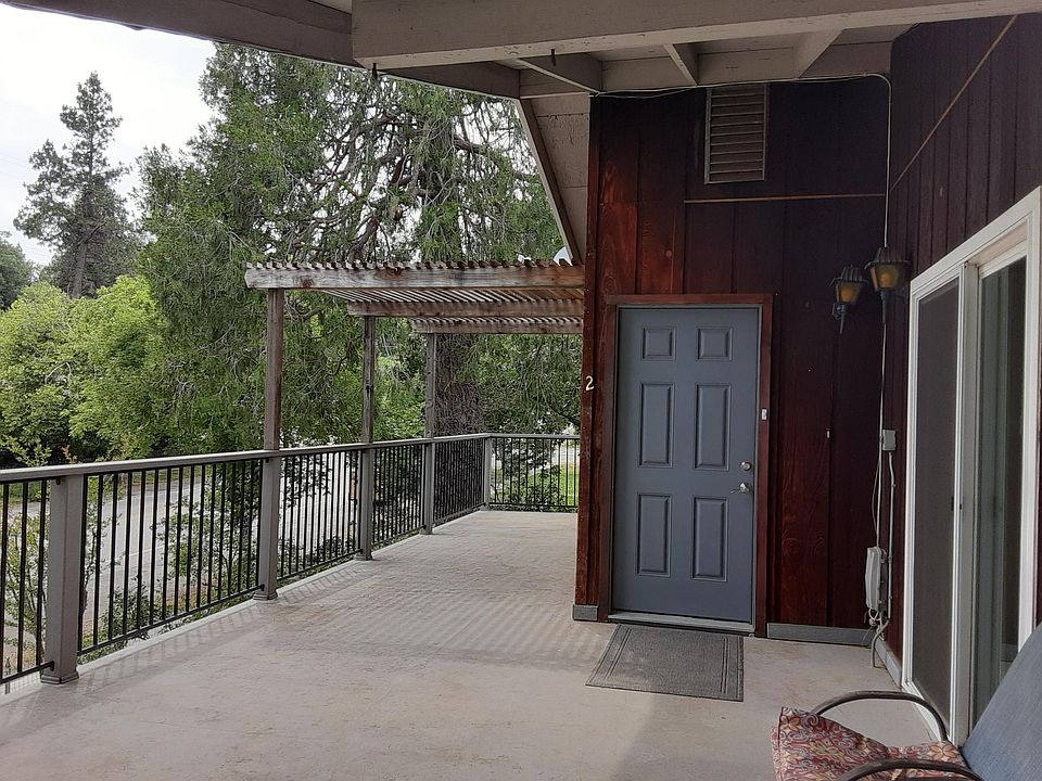 Front door of #2, sliding doors to right are entrance to @1.