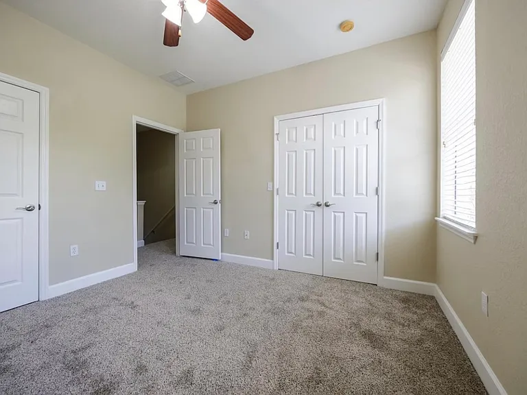 Guest bedroom with bathroom entry