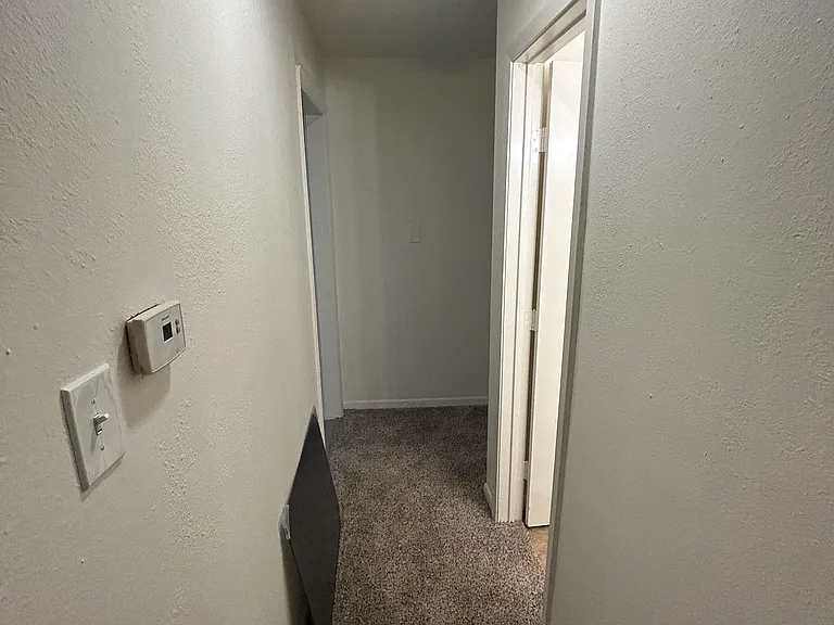 HALLWAY BETWEEN BEDROOMS