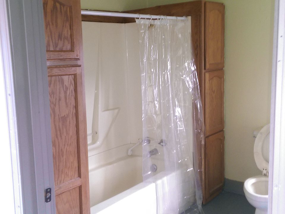 Full Bath with tub/shower and a stand up shower