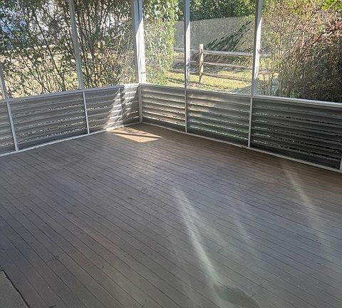 screened back porch with fan