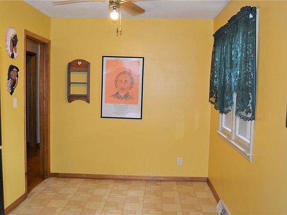 The other end of the large kitchen could be for a very large dining table or make it a family room with comfy chairs and keep the cook close to the action.