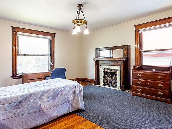 Room C with half bathroom and large closet. USB plug next to bed.