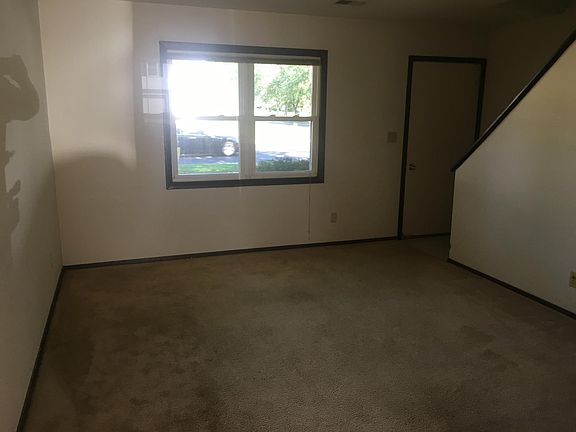 Living room and front door entrance.