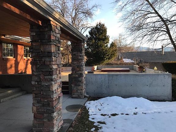 Back patio and deck with hot tub