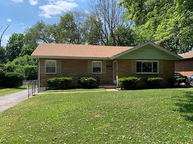 Beautiful solid brick home with ALL updated windows!