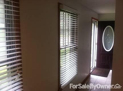 Looking from the kitchen into the entry way