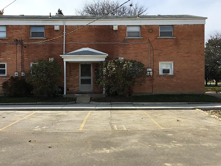 Newer parking lot with assigned parking spot