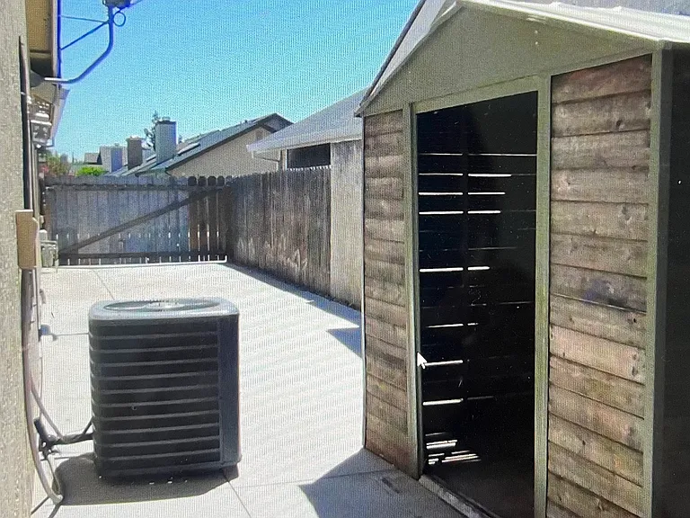Parking for RV, boat or a great play space for kids with locked gate.