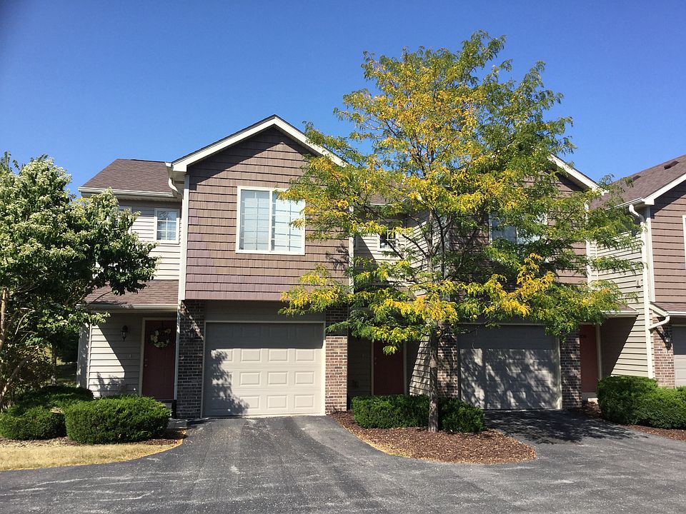 Much desired end unit, front view with private entrance
