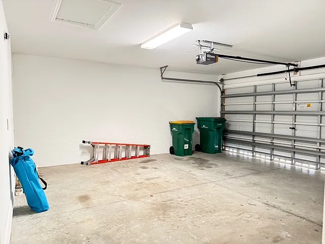 Double Car garage, beach chairs, grill