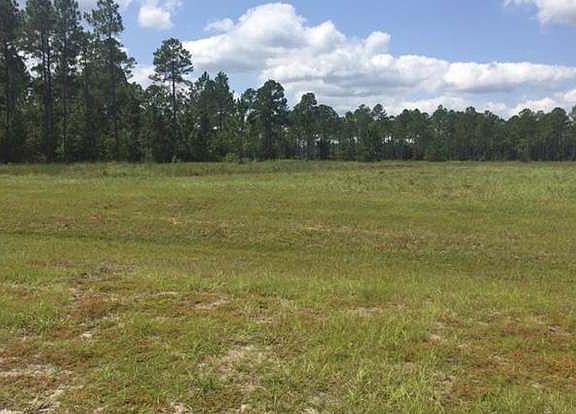 Expansive corner pond lot