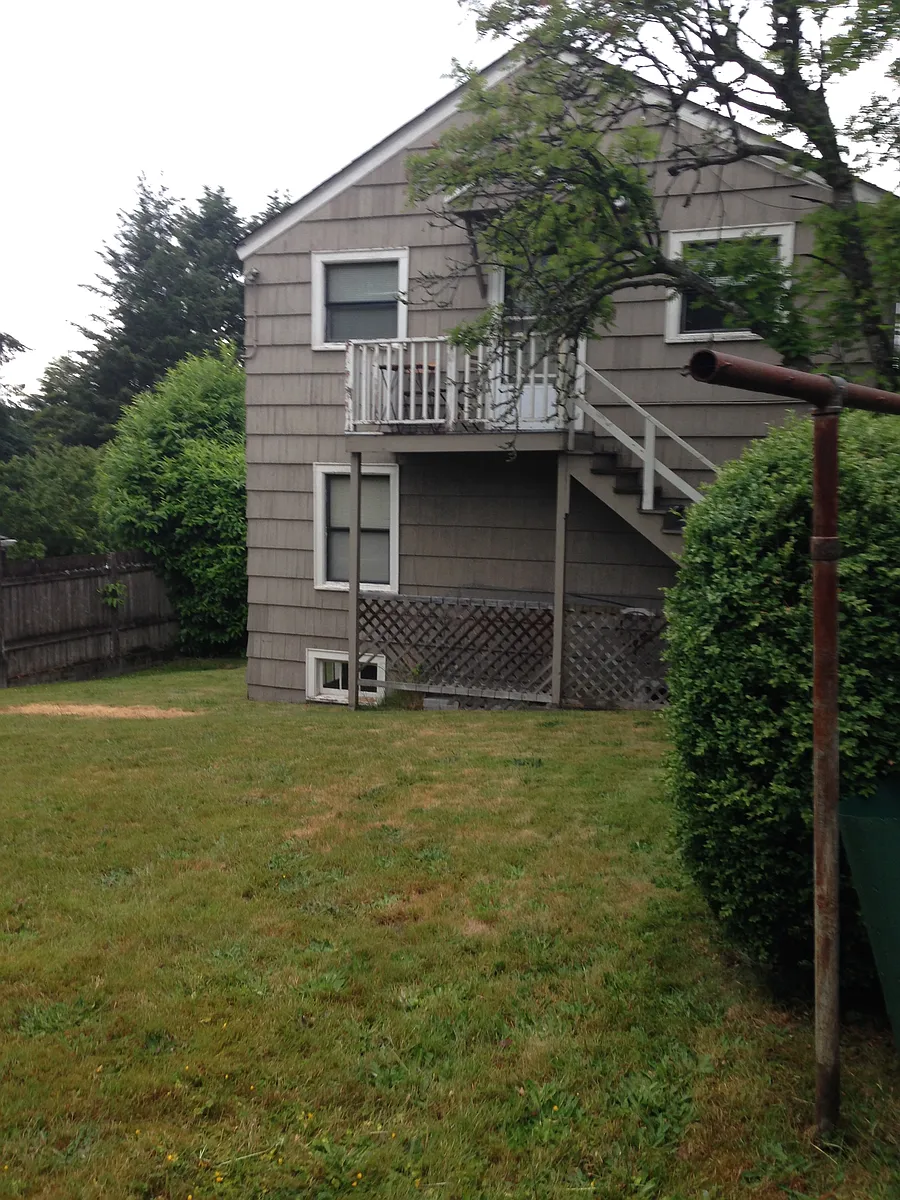Back yard of duplex with Entrance to the unit - 2635 NW 88th St #1/2