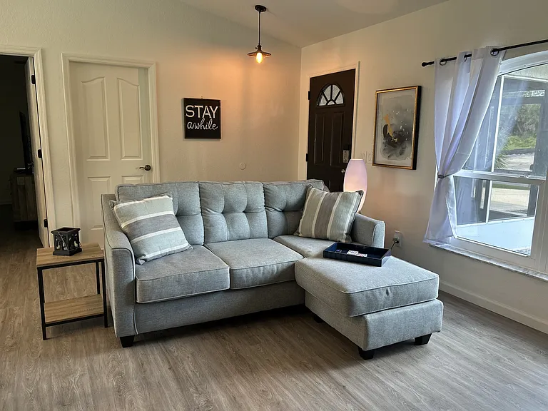 Family room open to the kitchen/dining area