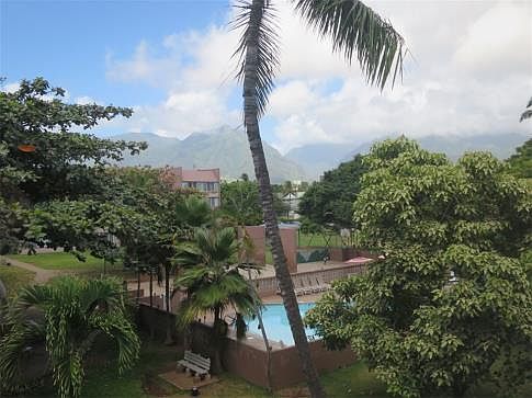 Enjoy Mountain views and water views of the pool from the bedroom and living room.