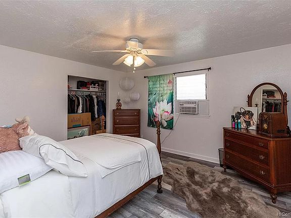 Large bedroom with closet.