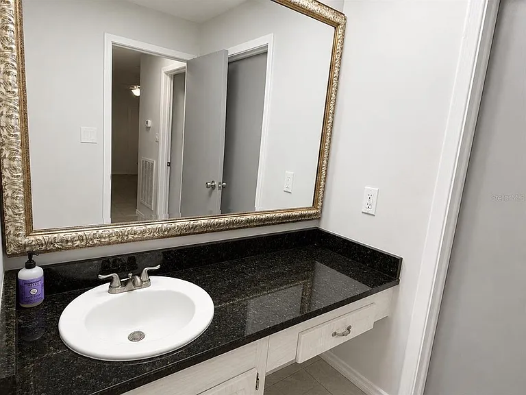 1706 Belleair Forest Dr #244 — Photo 16