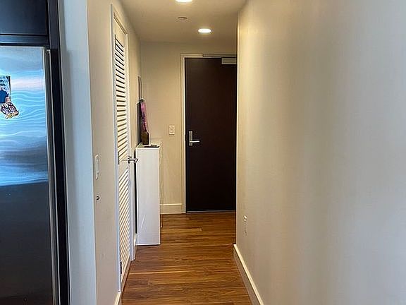 Hallway entry with storage