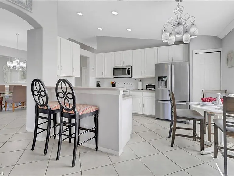 7477 Lourdes Ct — Photo 9