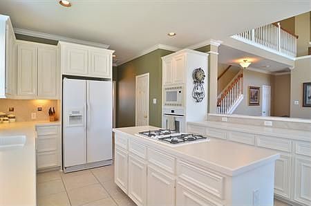 Island kitchen with Corian Counter tops