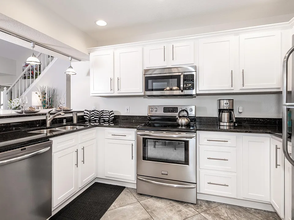 Stainless steel appliances in kitchen