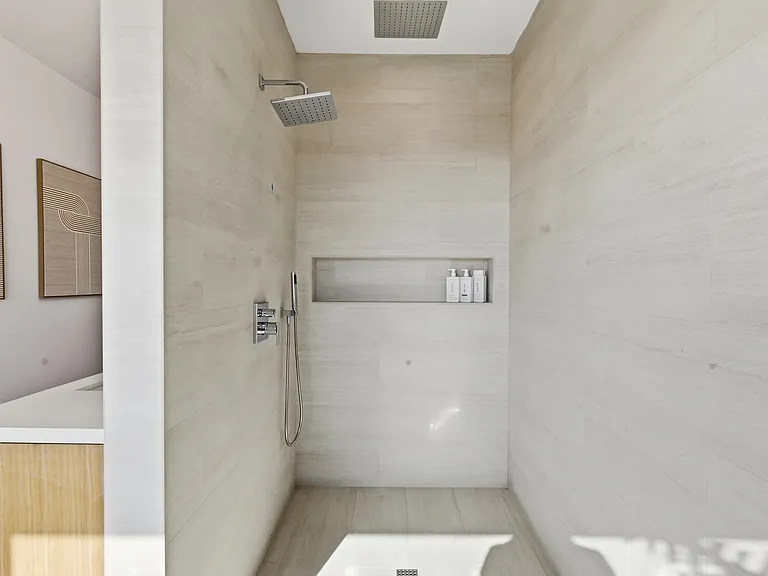 Primary bedroom features a covered balcony, fireplace, large spa bathroom, and incredibly spacious walk-in closet.