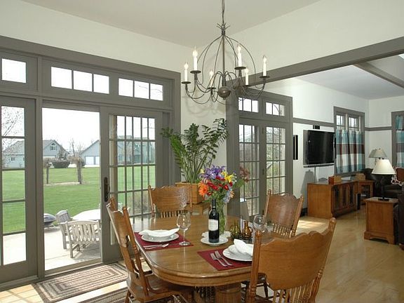 Sweeping views of the lovely yard compliment the casual dining area!