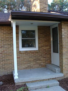 Front porch-updated with vinyl trim and new gutters.