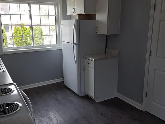 Kichen showing door to laundry