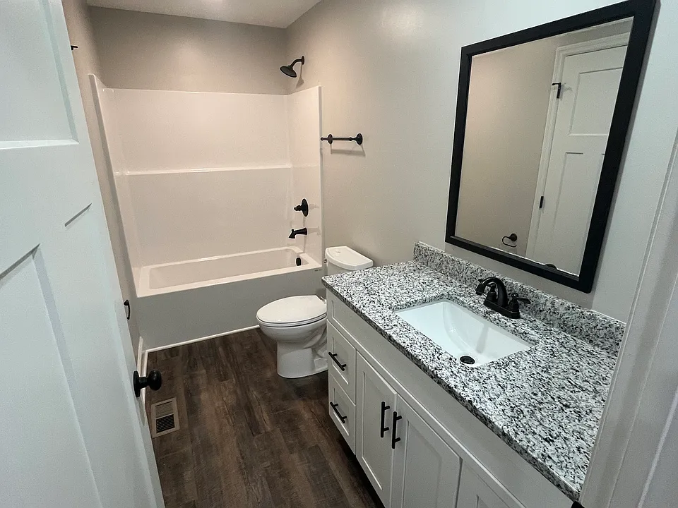 Beautiful brand new bathroom with dedicated laundry closet and hookups