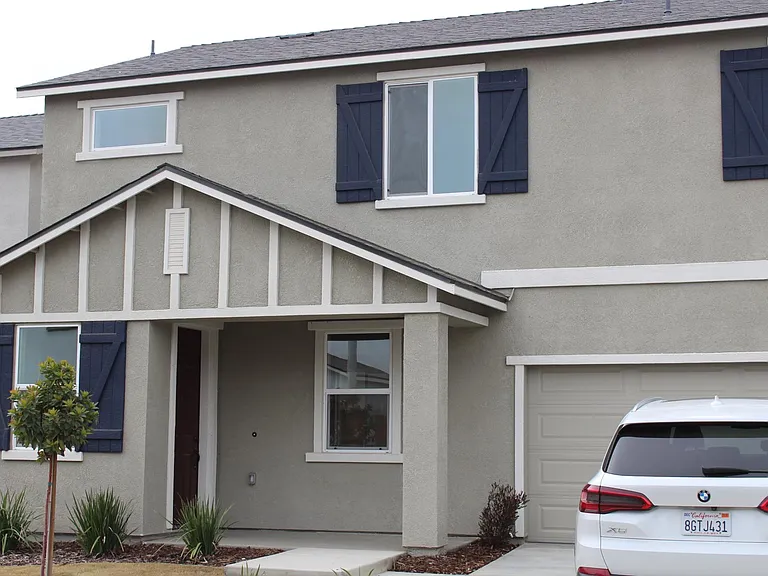 Front of home. Solar System. 2 car garage with automatic opener. Bedrooms are upstairs