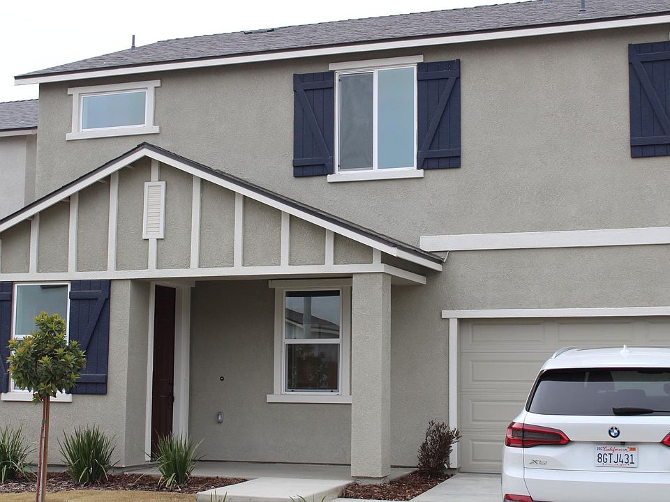 Front of home. Solar System. 2 car garage with automatic opener. Bedrooms are upstairs