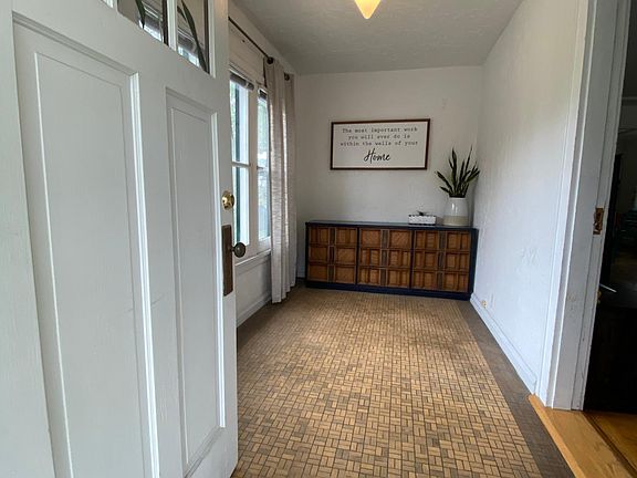 Walking into the home you enter into the bright front sunroom!