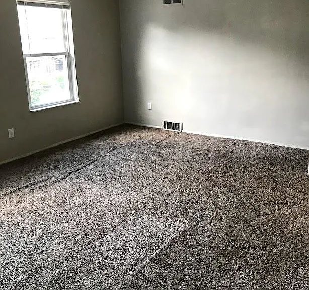 Master bedroom with plenty of room for King size bed and furniture.