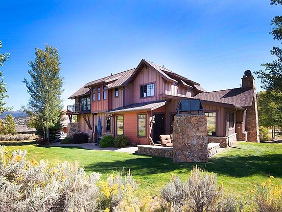 rear exterior with private outdoor fireplace