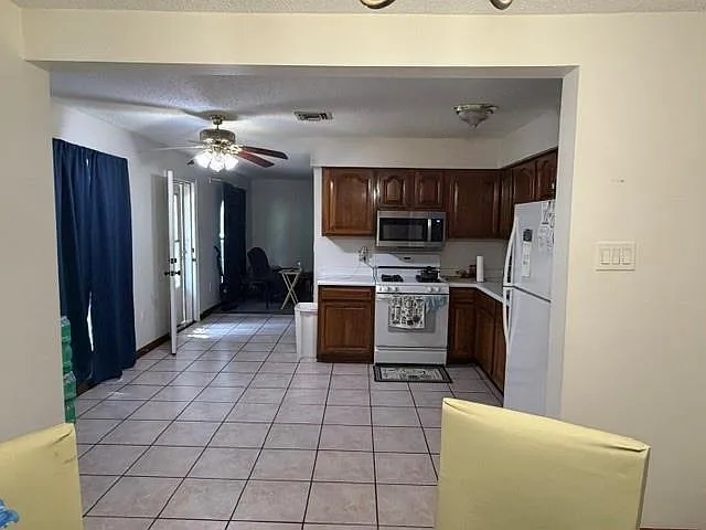 3637 E Loyola Dr — Photo 3
