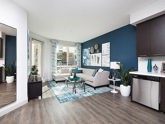 Hardwood-style flooring is available in entry, kitchens and select living and dining spaces