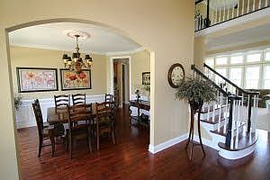 Dining room (opposite living room) w custom wainscotting
