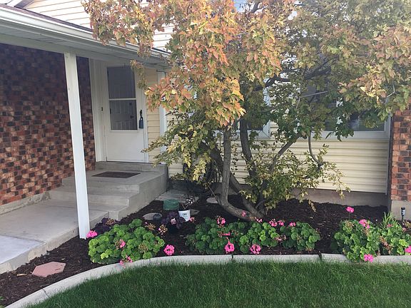 Covered Porch and Flower Bed